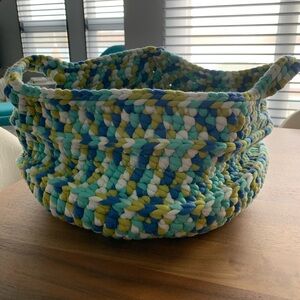 NEW!! Hand crocheted 12” diameter 9” high basket with handles.